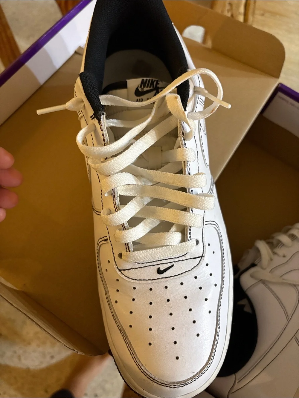 Nike White Leather Low-Top Sneakers with Black Soles